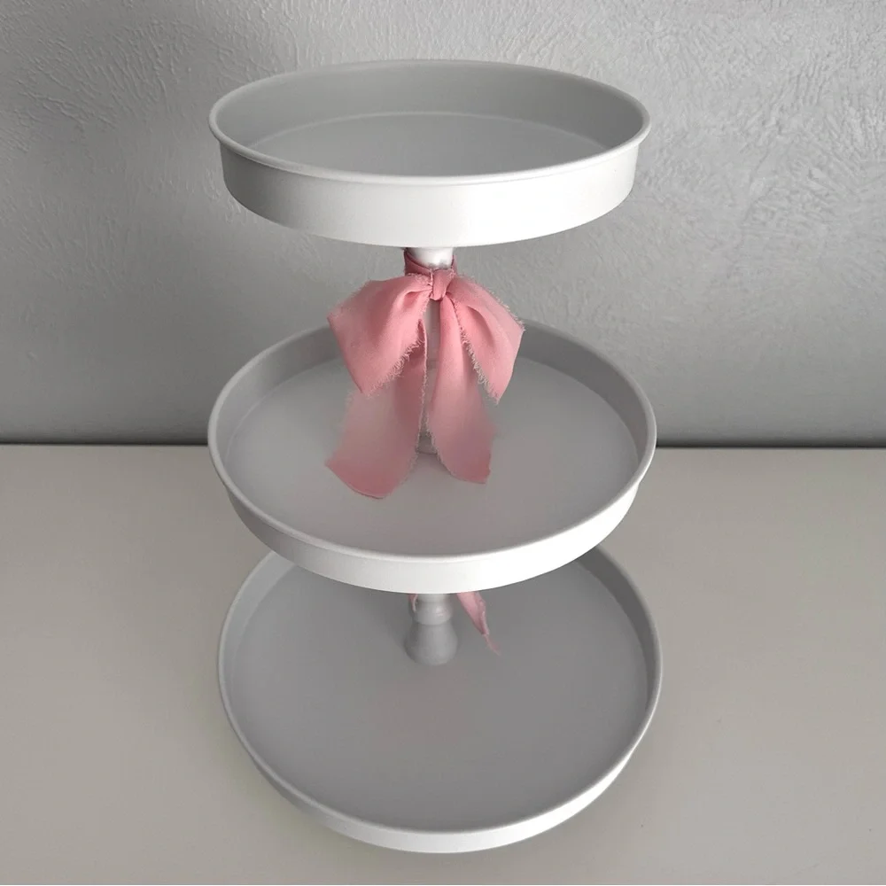 White Three-Tiered Stand with Pink Silk Bow Accents
